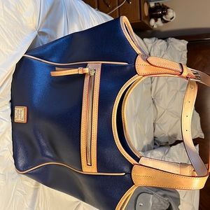 Like new Dooney and Bourne handbag. Not a mark on it inside or out.